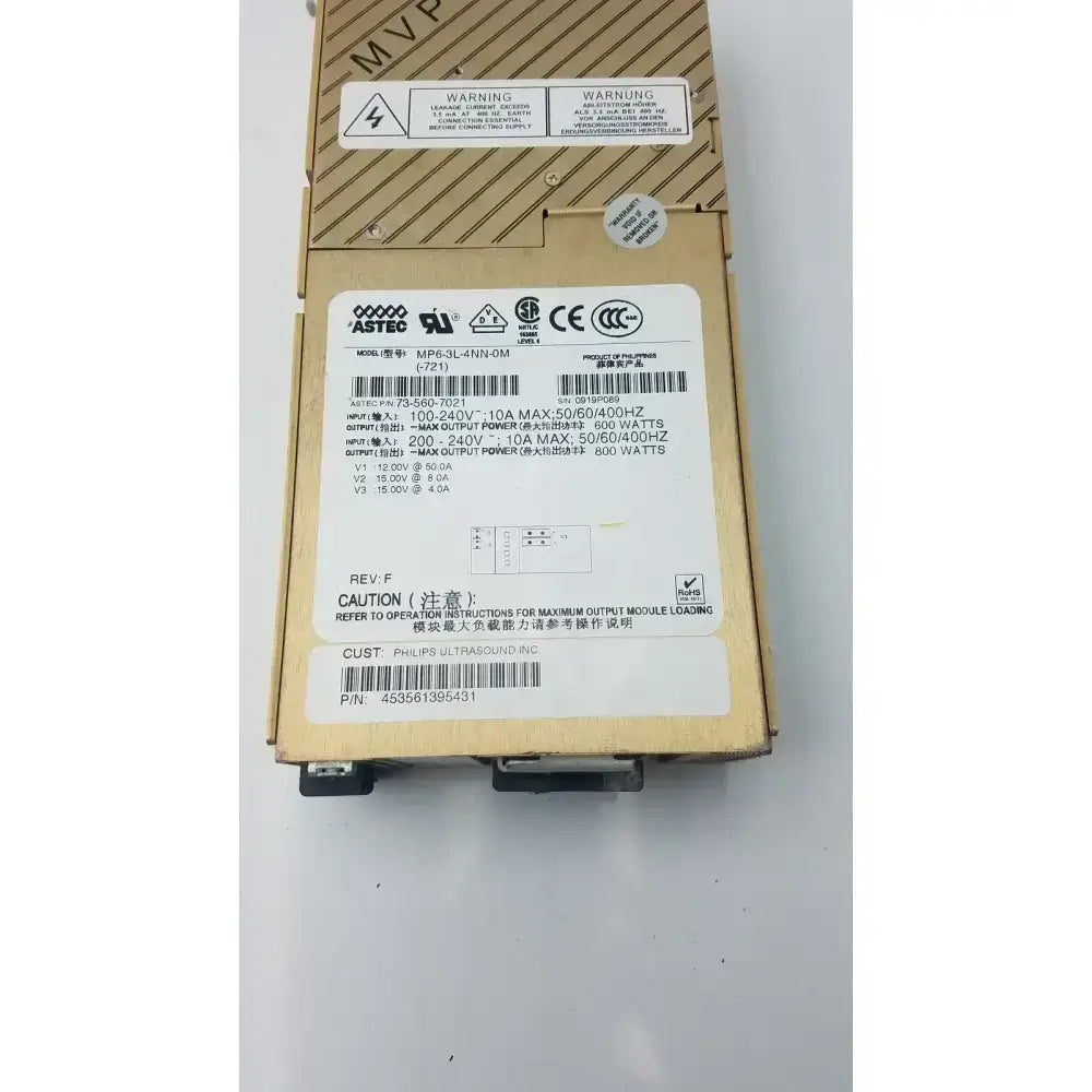 Beige metal Astec mp6-3l-4nn-0m modular power supply unit with printed specifications and warning labels