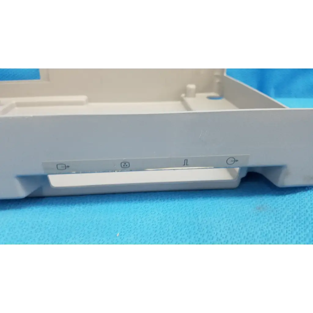White plastic base shroud plastic cover for trc-nw6s retinal camera with molded directional and power button icons
