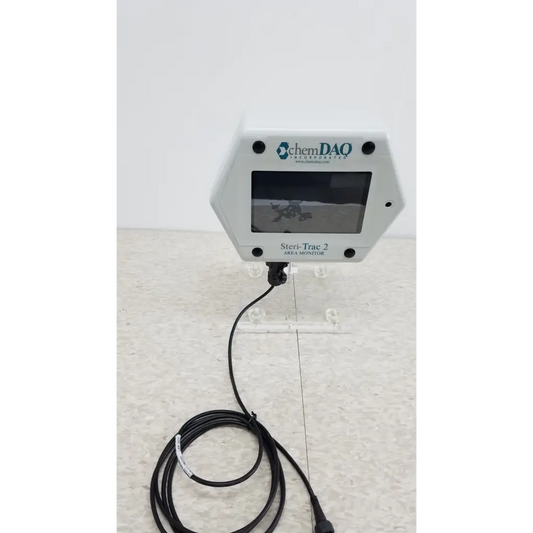 White hexagonal chemdaq steri-trac 2 peracetic acid monitor with black screen acrylic stand and coiled cable