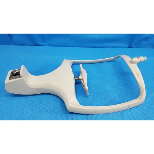 White plastic otoscope with curved handle and adjustable headpiece for chin rest assembly frame topcon trc-nw8 retinal camera