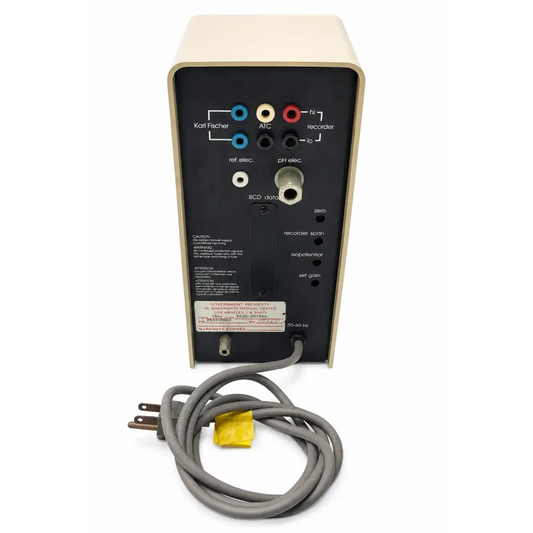 Beige and black karl fischer moisture analyzer with labeled ports and coiled gray power cord for corning science benchtop meter