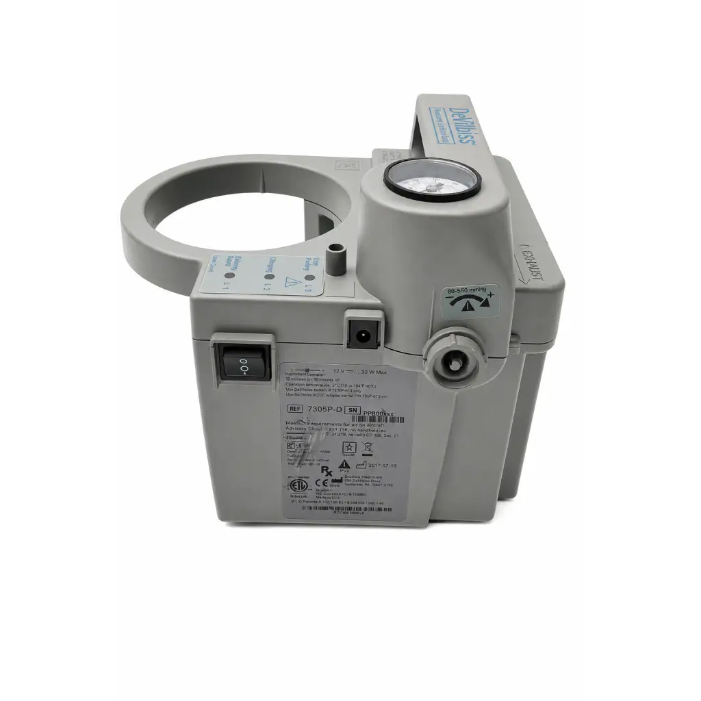 Gray plastic devilibiss compressor nebulizer unit with circular port pressure gauge and control panel for medical use