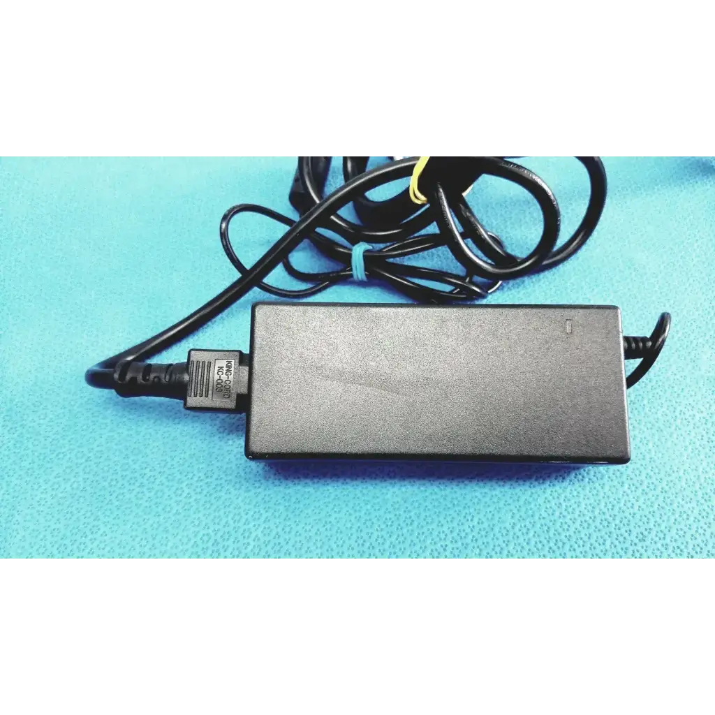 Black rectangular edacpower elec em110111m-190 adapter power supply with coiled cable and molded plug end