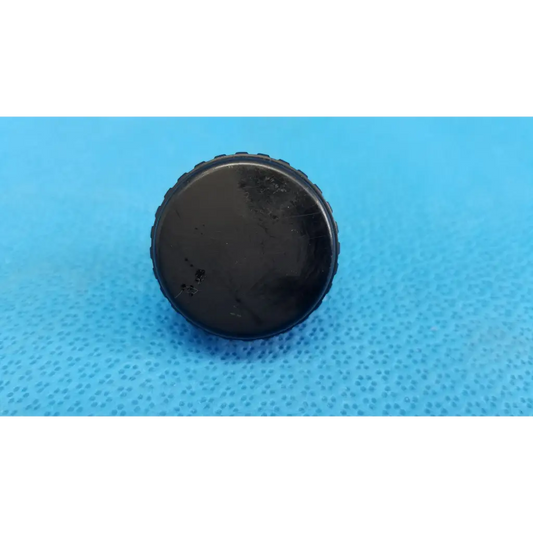 Black plastic external control panel extension dial adjustment knob with textured ridged edge for topcon fundus camera