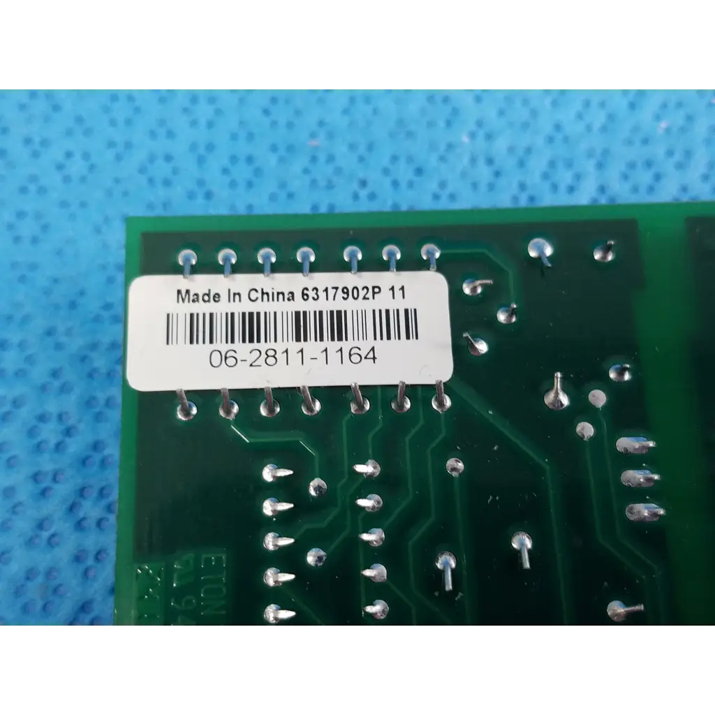 Green printed circuit board with silver soldered pins and made in china label for hill rom total care control board assembly