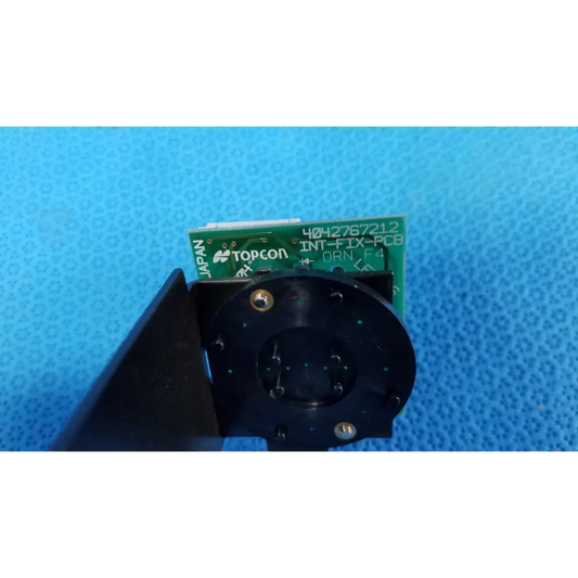 Green Topcon INT-FIX-PCB internal fixation target circuit board with black mounting bracket for retinal camera use