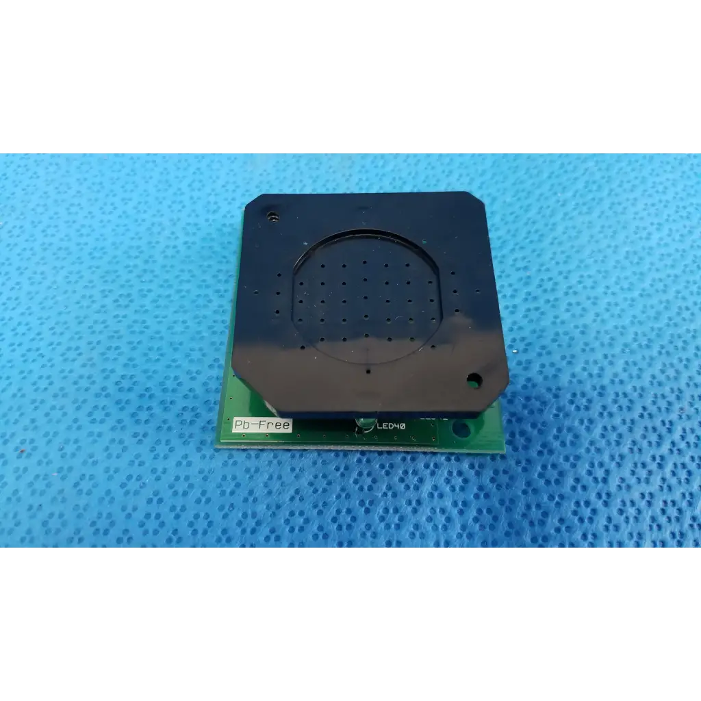 Black rectangular speaker module with perforated grille on green pcb labeled pb-free and led48 fixation led target board for topcon camera