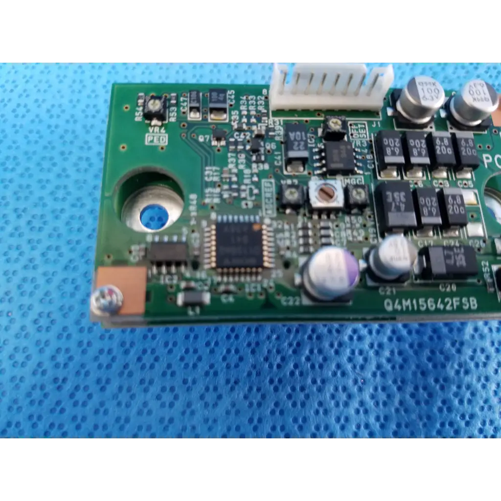 Green printed circuit board with capacitors resistors and a central microchip internal image sensor for topcon retinal camera