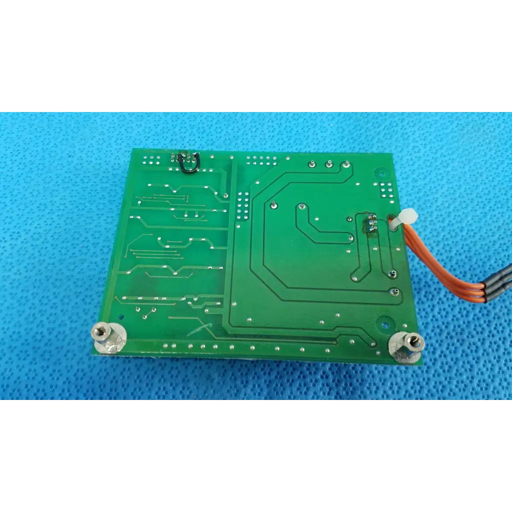 Green rectangular illumination circuit board with silver soldered components and orange wiring for Topcon retinal camera
