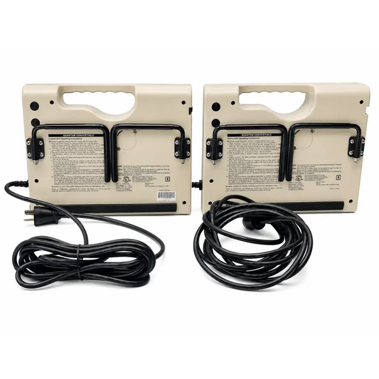 Beige plastic portable accumax quantum convertible control units with black cords and mounting brackets