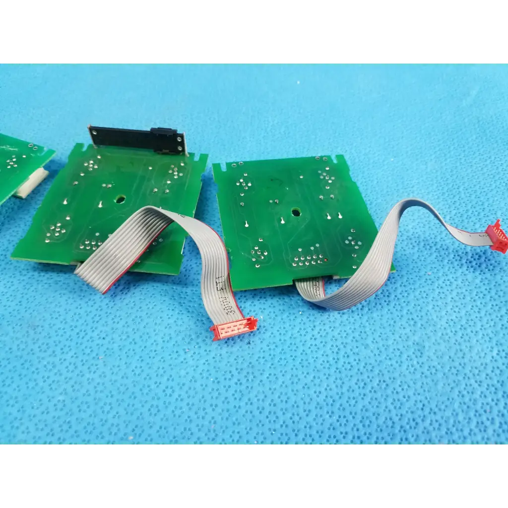 Lot of 3 hill-rom green circuit boards with silver ribbon cables and red connectors for total care bariatric bed use