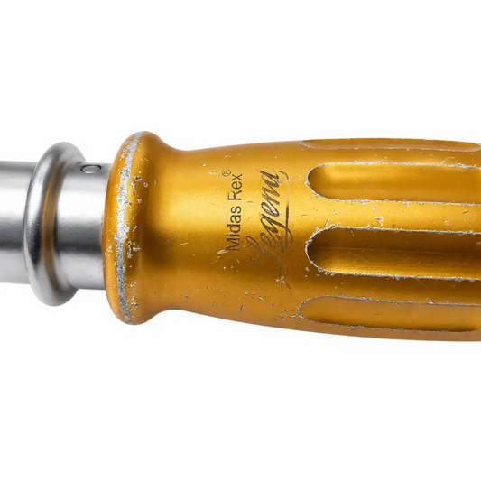 Gold-colored textured surgical driver handle midas rex with engraved branding and visible wear legend model