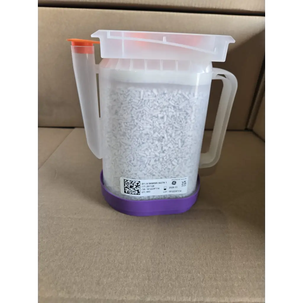 Clear plastic container with orange spout and purple base filled with healthcare zplege-01 absorbent granules
