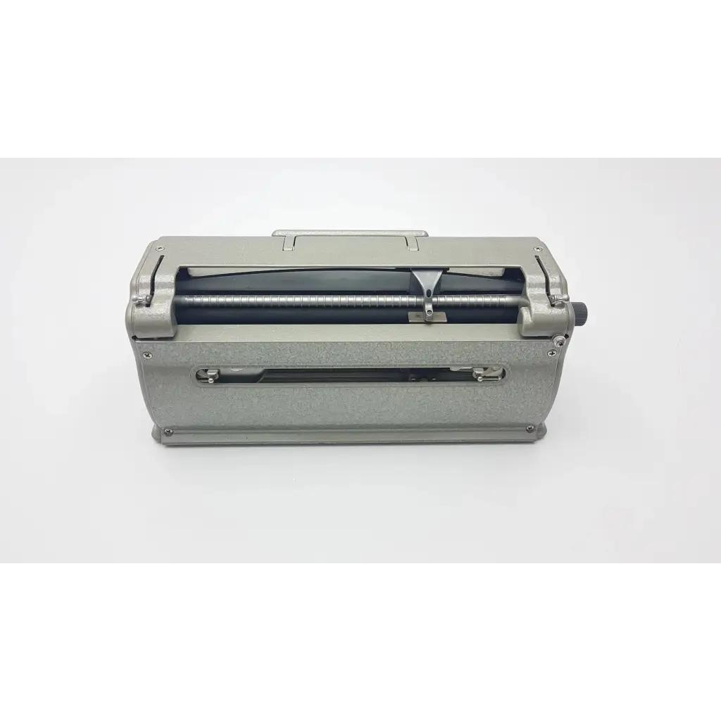 Silver metallic manual paper cutter with sturdy body and internal rollers for perkins classic brailler use