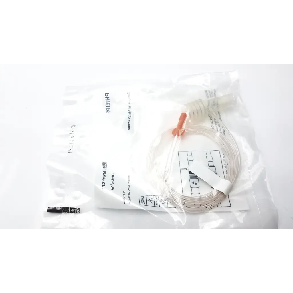 Philips Microstream Filterline set clear plastic iv tubing with white connector and orange cap in sterile bag