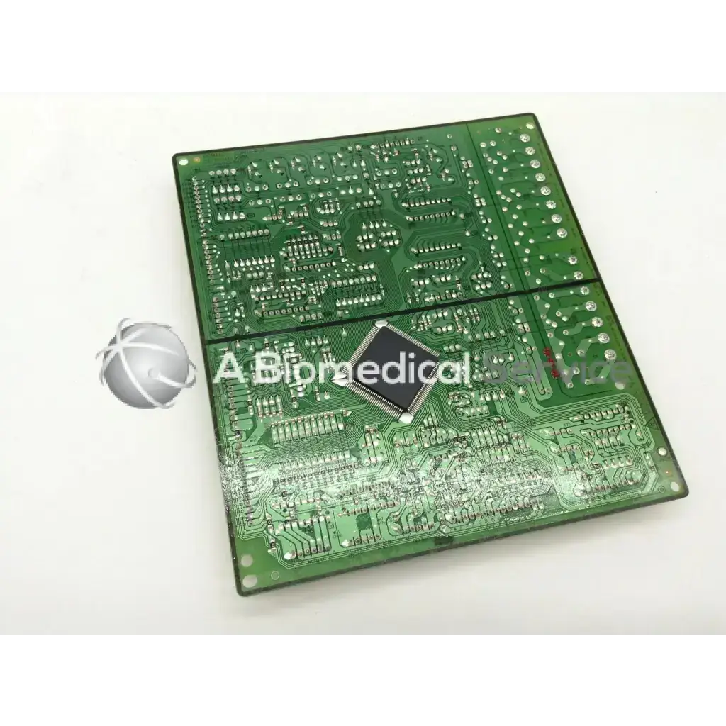 Green rectangular samsung fridge main control board da92-00447c with black integrated circuit chip mounted at center