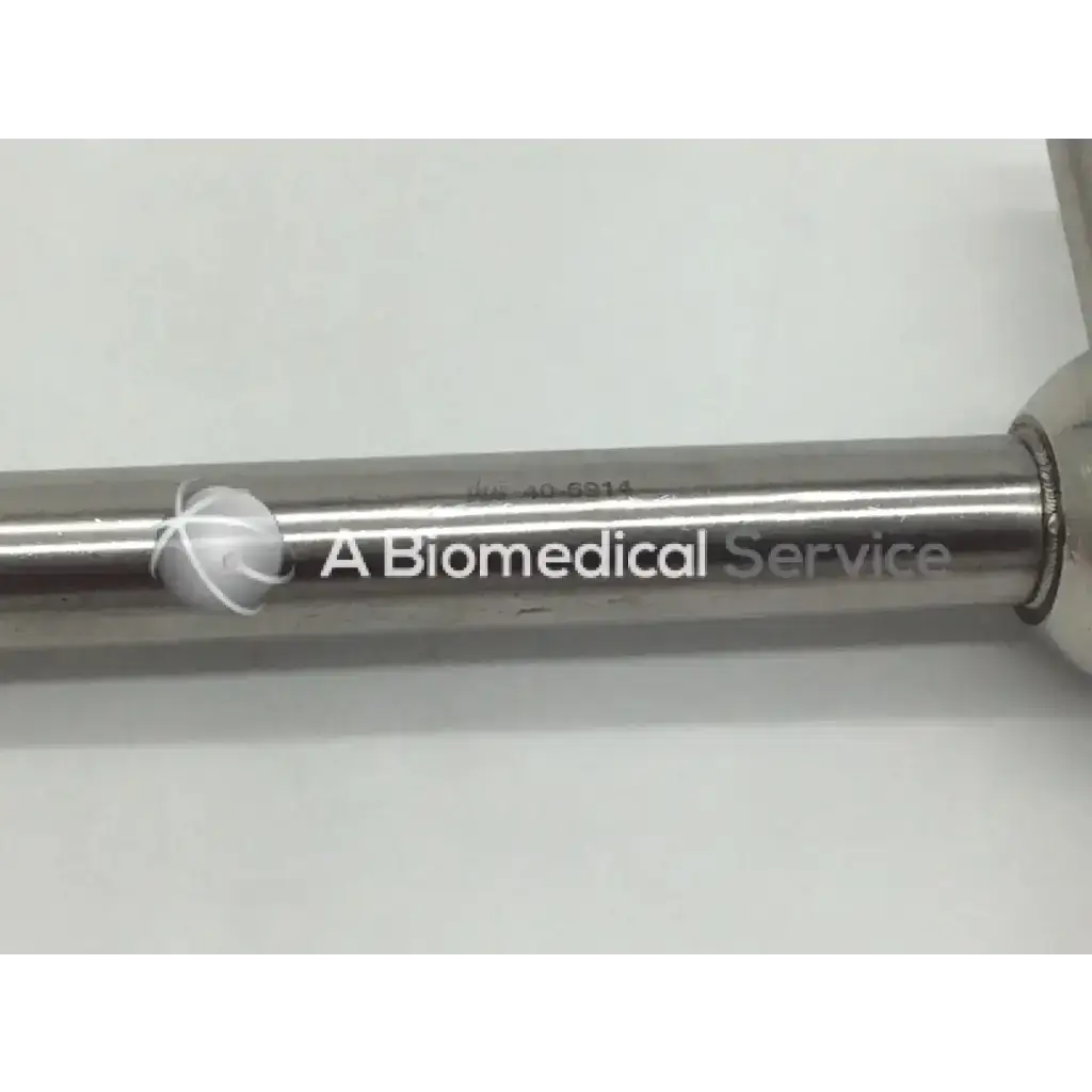 A sleek metallic cylindrical sklar instrument made of polished stainless steel for meyerding hip and shoulder skid use
