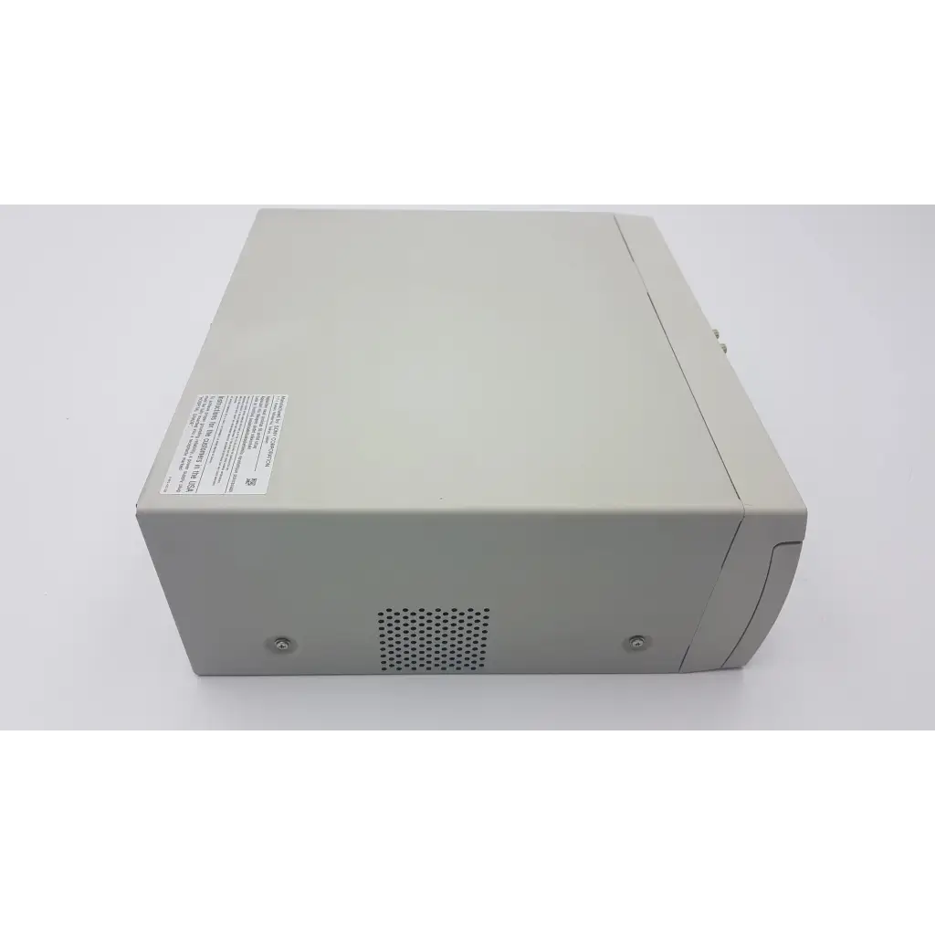Beige plastic sony up-990ad hybrid graphic printer with perforated ventilation grille on the front for hybrid graphic use
