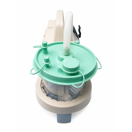 Beige and mint green SSCOR II 2314B portable suction unit with clear plastic chamber and tubing