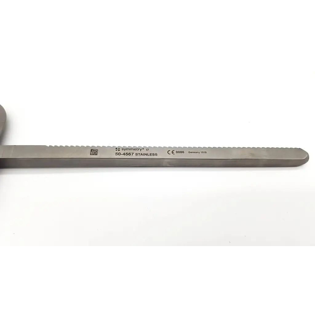 A sleek metallic retractor blade malleable with a serrated edge and engraved model number on the surface