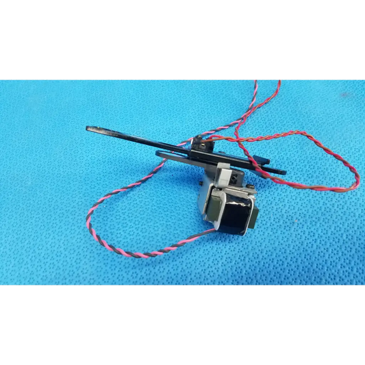 Black and silver Takano SAP1-T115A rotary solenoid optical filter slider with red and black twisted wires for Topcon camera