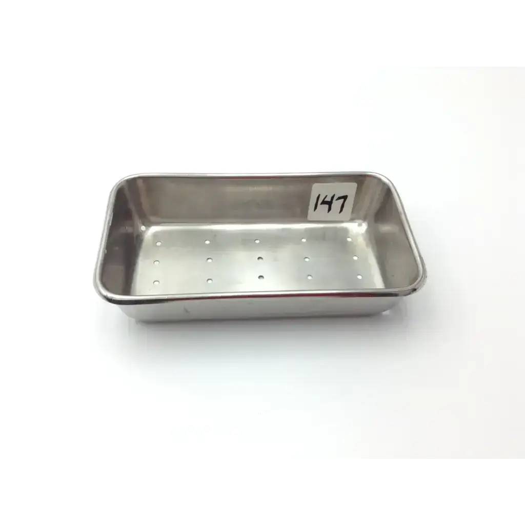 Vollrath stainless steel perforated rectangular instrument tray with rounded corners and perforated bottom