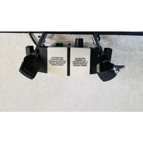 Black and white welch allyn 74710 wall transformer industrial control panel with labeled switches and knobs for reuse medical