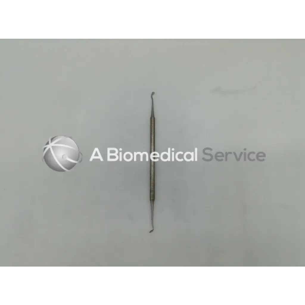 Stainless steel henry schein carver 5t double end dental instrument with textured handle and dual-ended tips