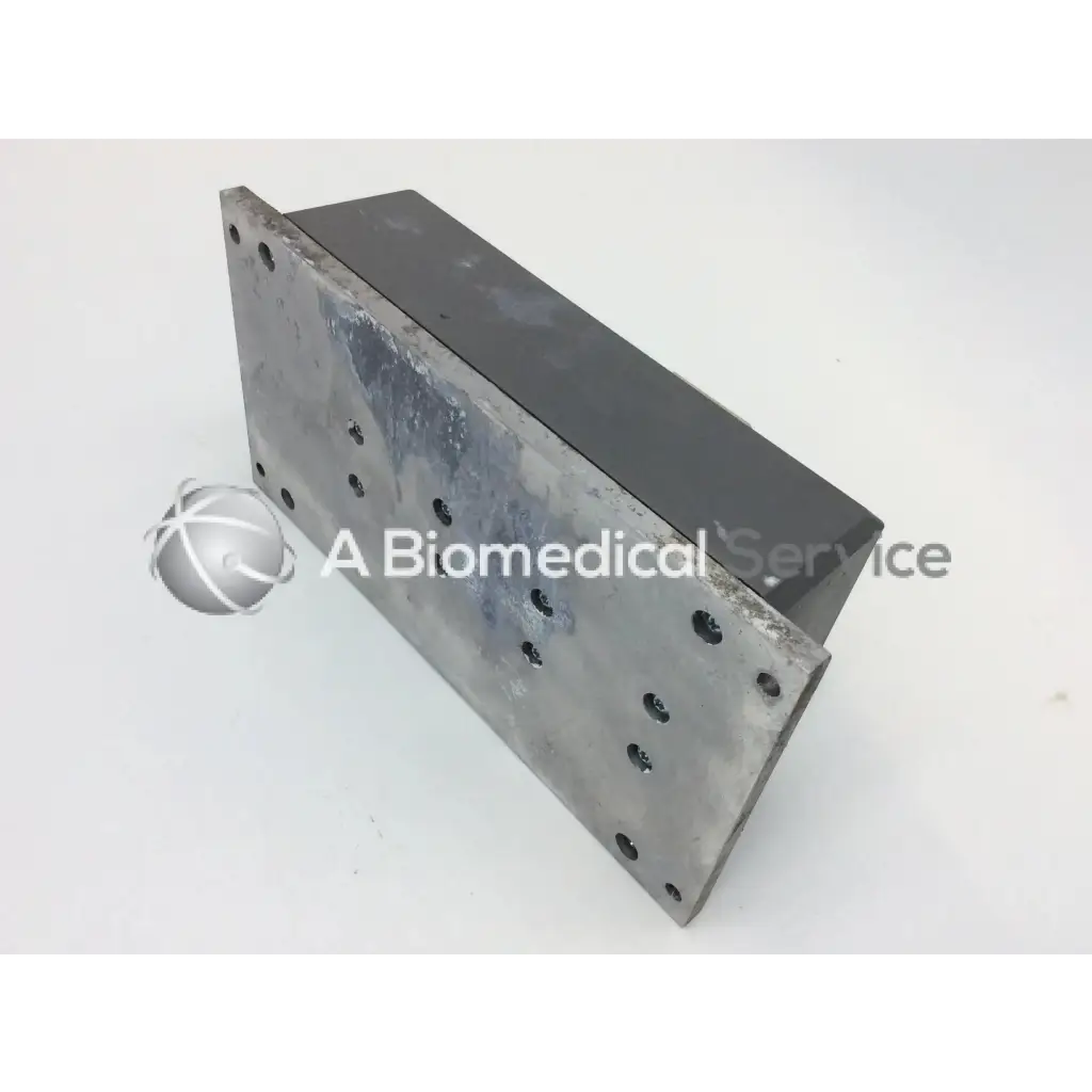 Rectangular metallic plate with dark gray worn surface and holes for mounting the inmotion 307340-000 pump speed controller
