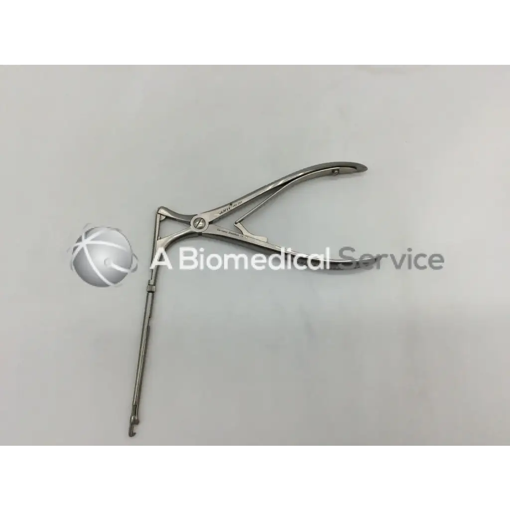 Silver mckenty rotatable punch with a curved articulated design and long handle 90 degree angle stainless surgical tool