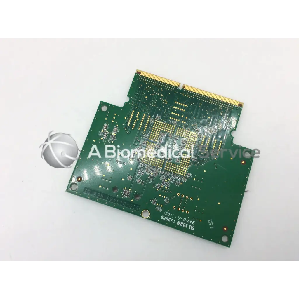 Green printed circuit board with gold contacts and central chip for juniper saipan crypto pic main board revision 01