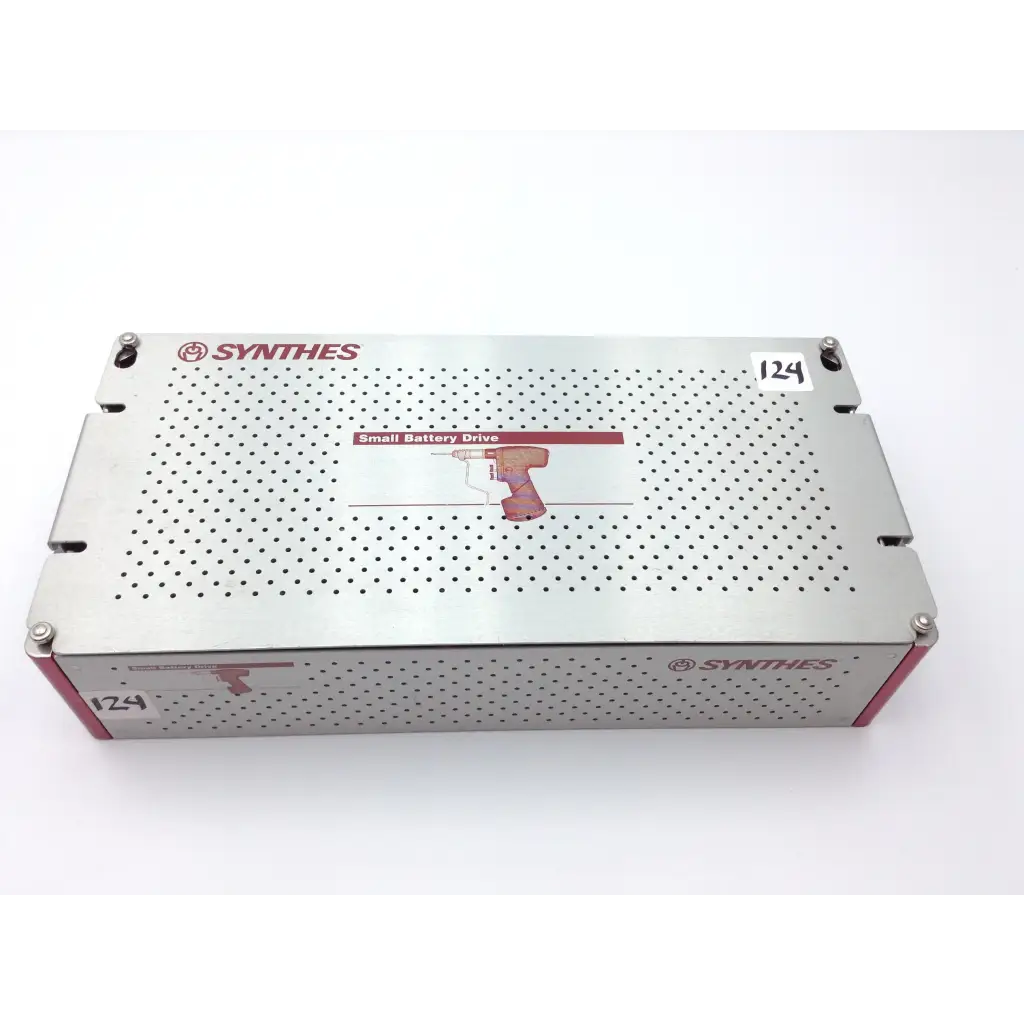 Silver perforated metal swiss Synthes small battery power drive with red accents in a compact case for battery drive use
