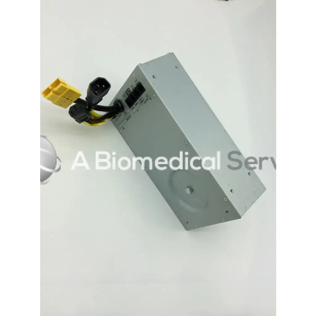 Silver metallic rectangular tripp lite hc150sl medical cart power supply unit with black and yellow connectors 150w 120v