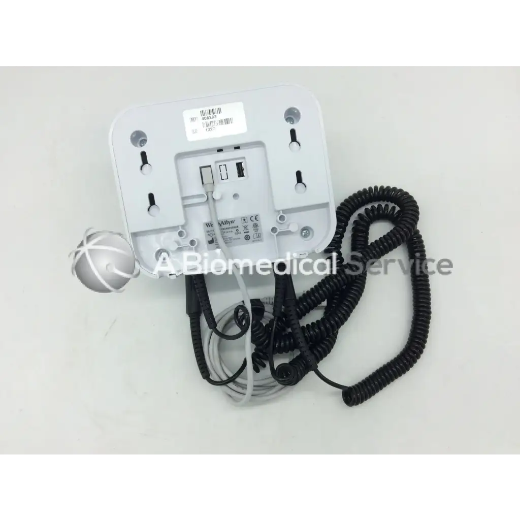 White plastic wall-mounted welch allyn green series wall transformer opthalmoscope with coiled black and gray cables and spherical sensor