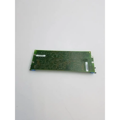 Green rectangular rev d control board bbcb2-11 with intricate copper traces and two white label stickers