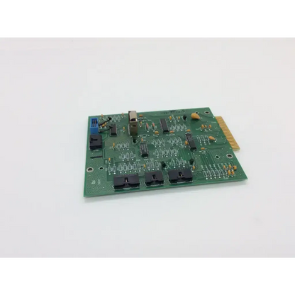 Green printed circuit board rev c board with black and gold electronic components for biomedical service and responsible electronics recycling