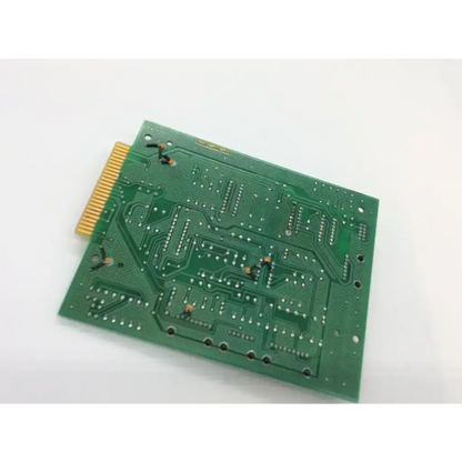 Green rectangular rev c board with gold connector pins and copper traces for biomedical service and responsible electronics recycling