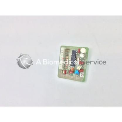 Green rectangular sony board with resistors capacitors and black ic for biomedical service and responsible electronics recycling