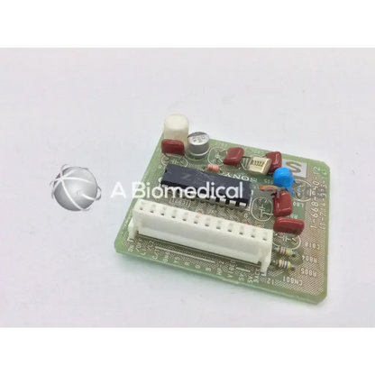 Green sony board 1-668-850-12 with red blue capacitors black ic chip and white connectors for responsible electronics recycling
