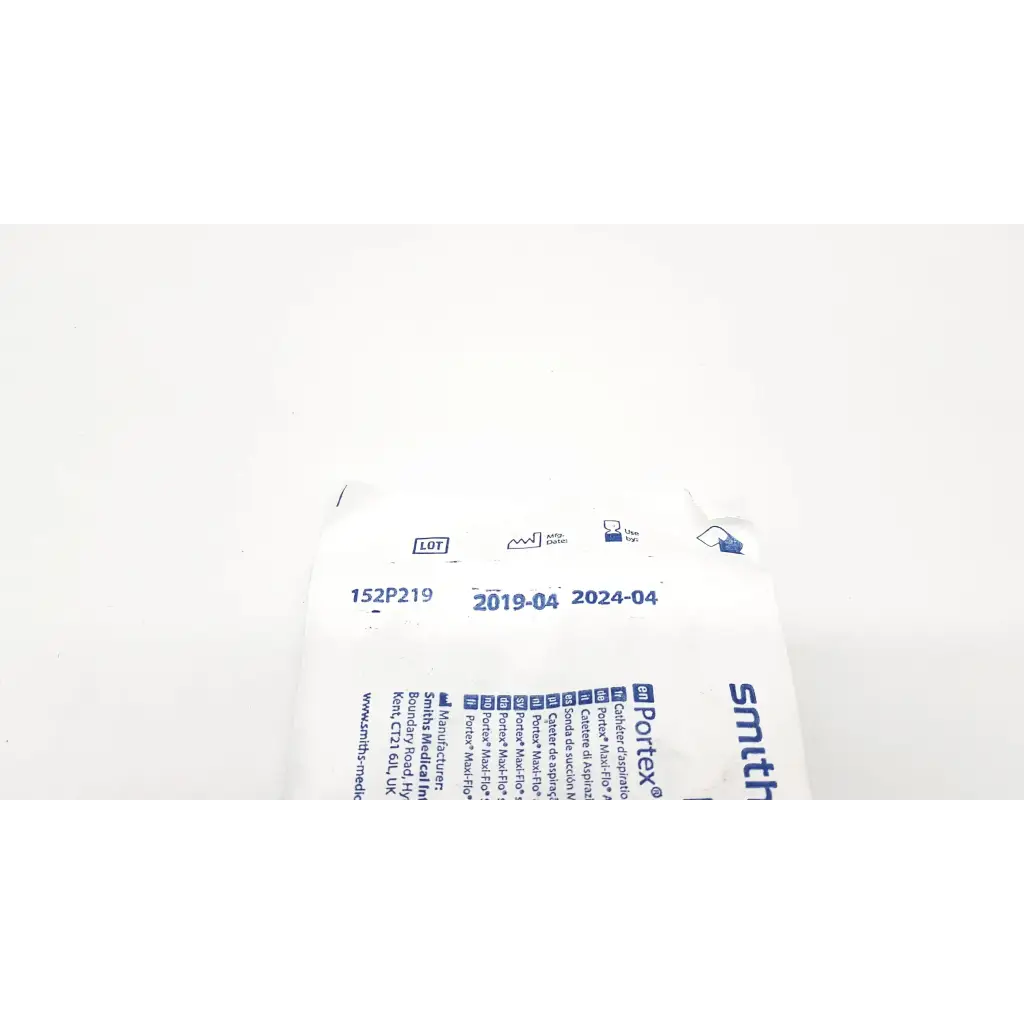 White plastic package of smith & porex 10 fr suction cath n glove with blue text lot number 152p219 dated april 2019 to 2024