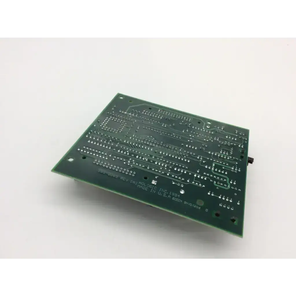 Green rectangular control panel board with silver conductive traces for hologic bone densitometer model 140-0053