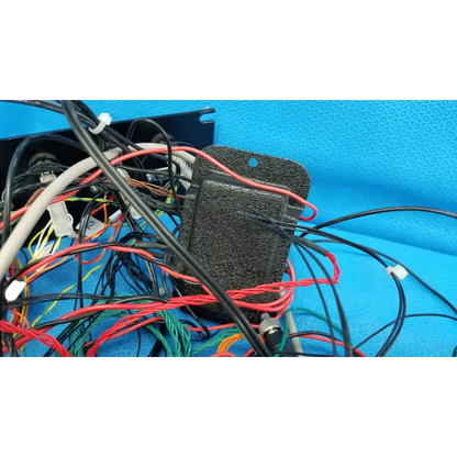 Black textured 19-inch rackmount control panel interface chassis with colorful wire harness for communications test signal switch