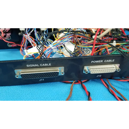 Black panel interface with two d-sub connectors labeled signal cable j11 and power cable j12 on control panel interface back side