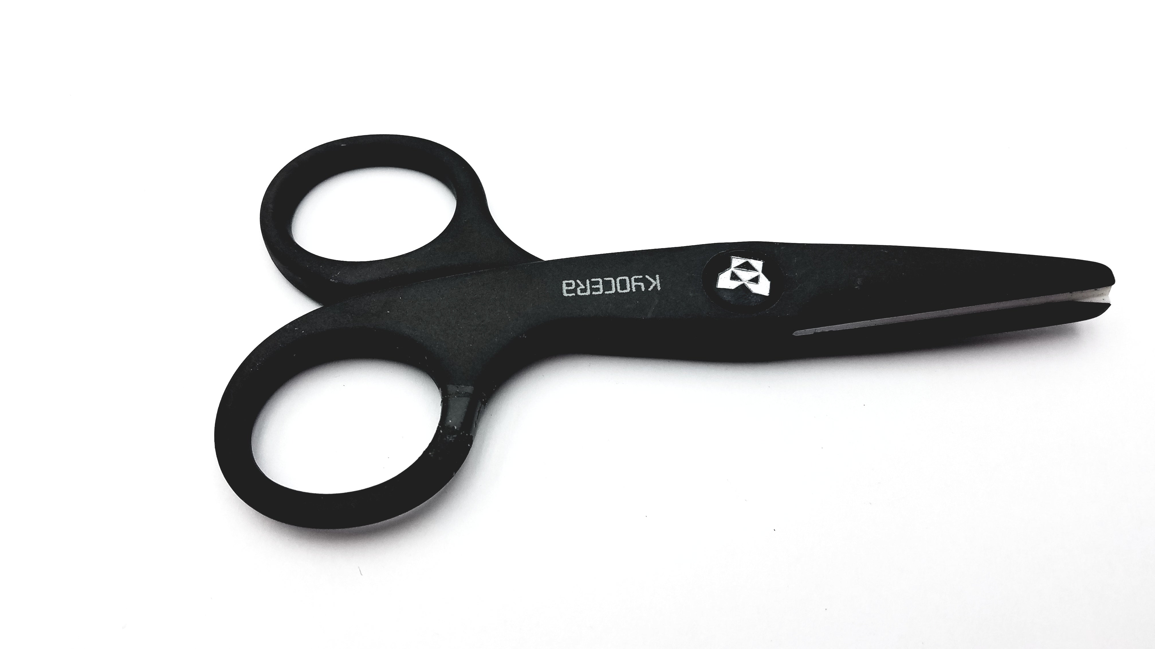 KYOCERA > Ceramic scissors are rust-proof, lightweight, non-conductive and  easy to clean.