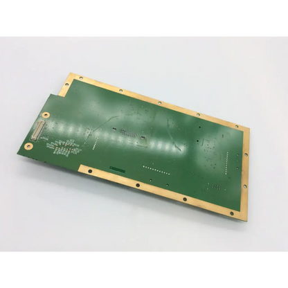 Green rectangular controller board with gold metallic edges and mounting holes for biomedical service replacement parts