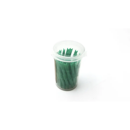 Green plastic toothpicks in a clear cylindrical container with lid shown alongside 32 count starkey custom hearing aid medium brown microphone covers