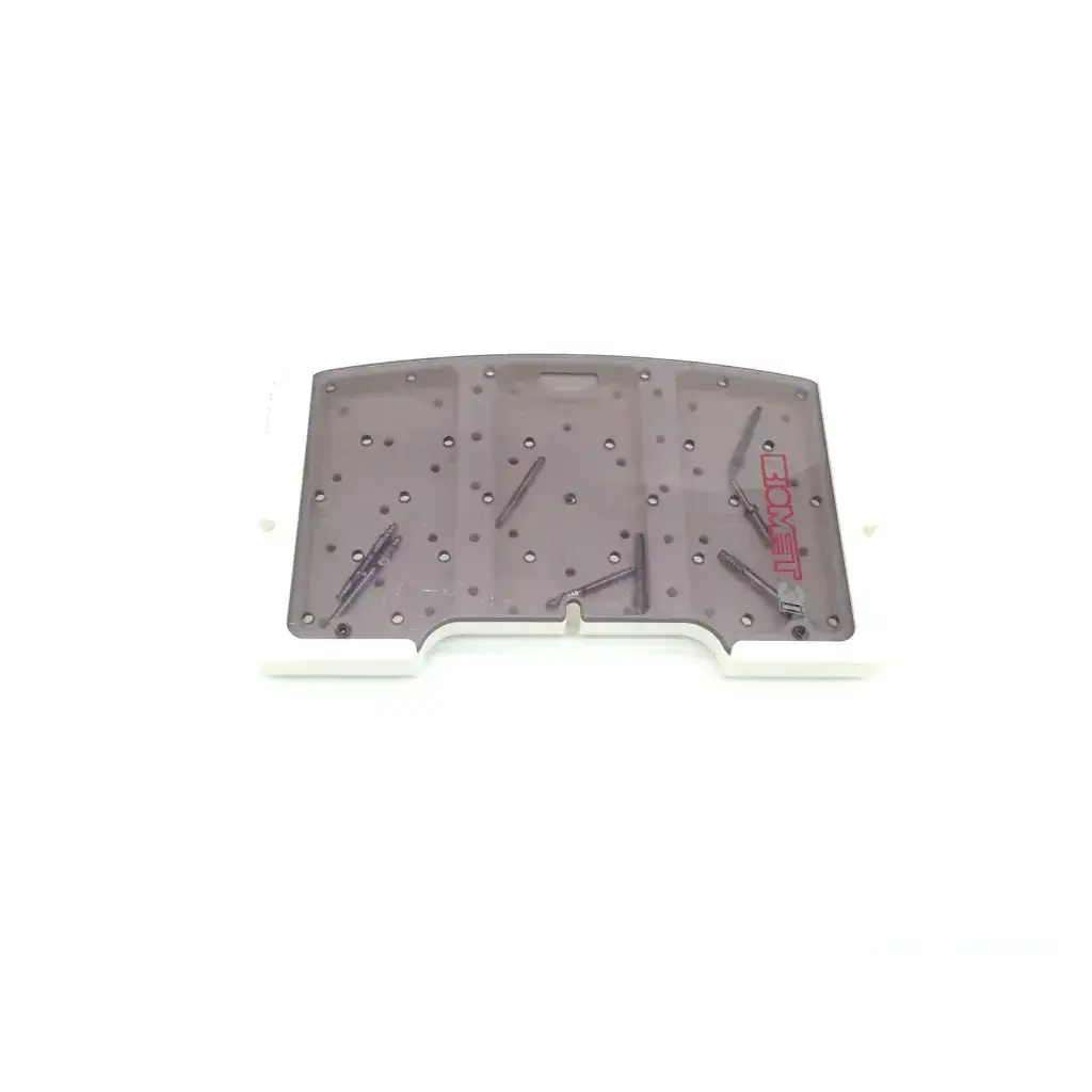 Gray translucent plastic surgical instrument tray with red lexus branding holding metal tools for tapered implant depth