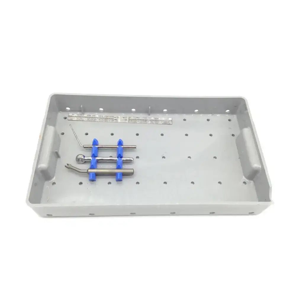 Gray plastic 3i biomet dental implant surgery instrument kit with blue-handled tools and metal ruler for tapered implant depth