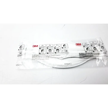 White 3m aura 9210 plus protective face mask in clear packaging with instructional diagrams and product information visible