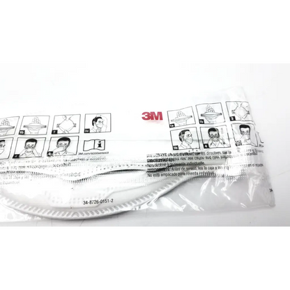 White 3m aura 9210+ protective face mask in clear packaging with instructional diagrams and product code visible